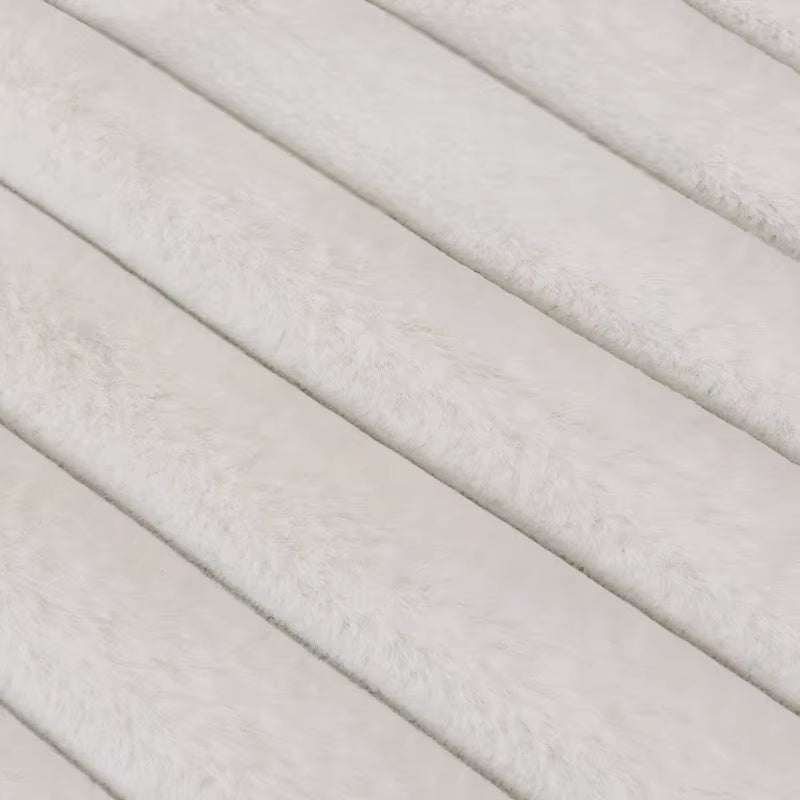 Witte hondenmand voor de bank ribfluweel detail